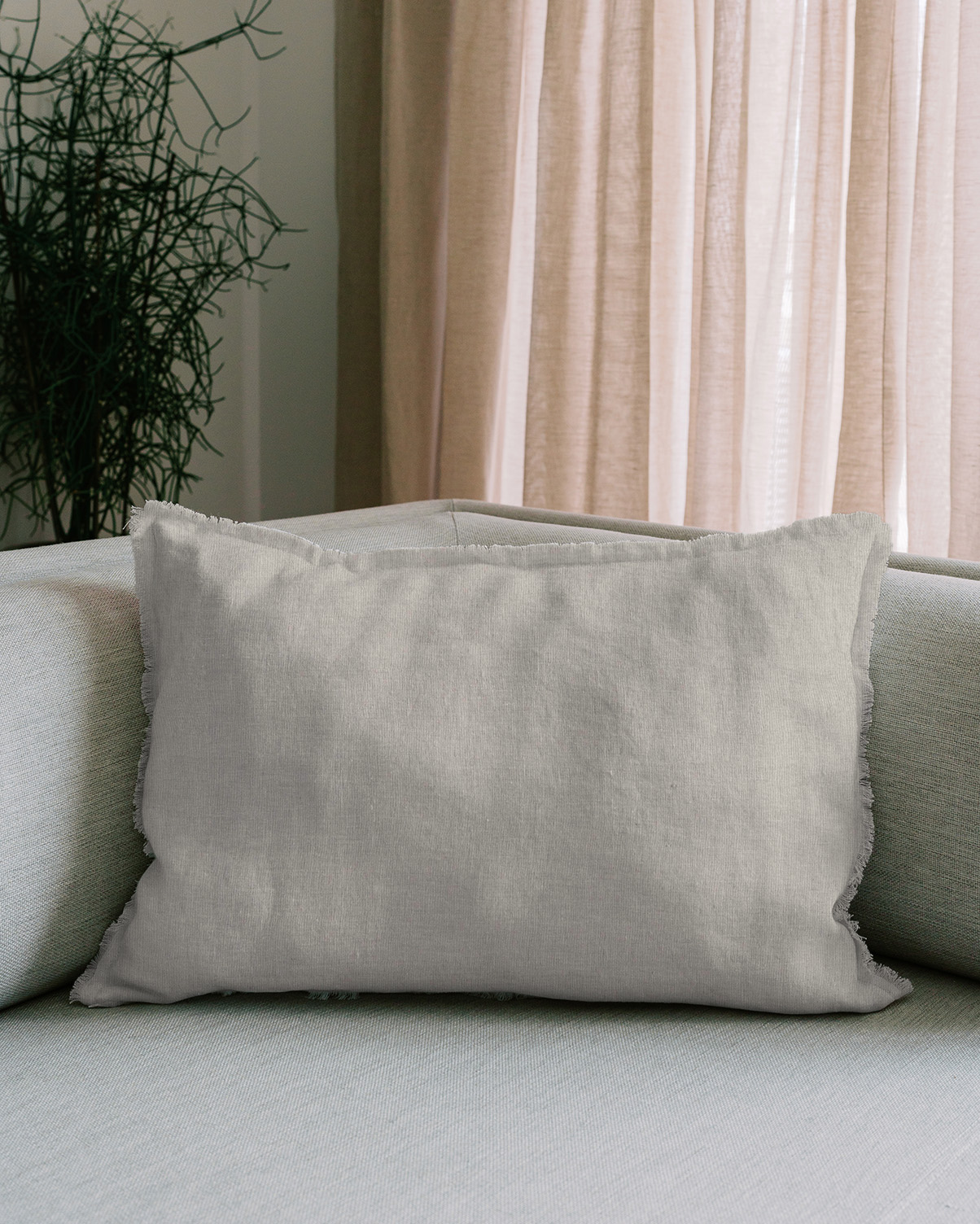 HUG Kissen mit Fransen 50x60