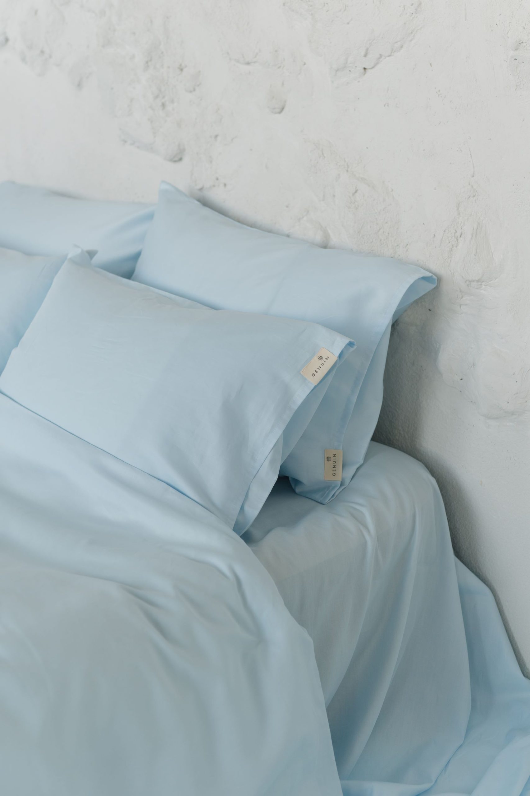 Kissenbezüge aus wasserblauem Baumwollsatin